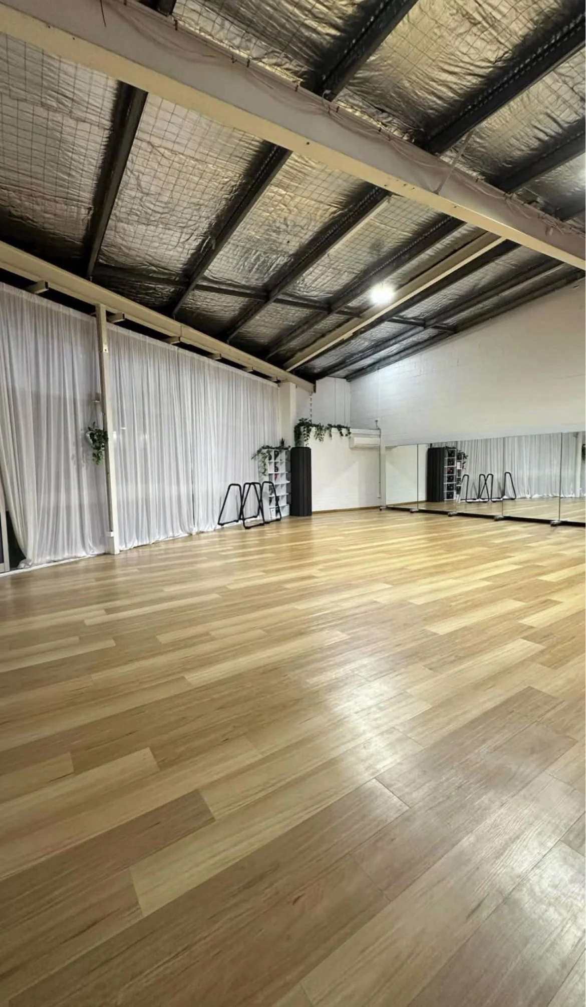 Elite Latin Dance Co. dedicated Bundall studio with purpose-laid timber dance floor and mirrors