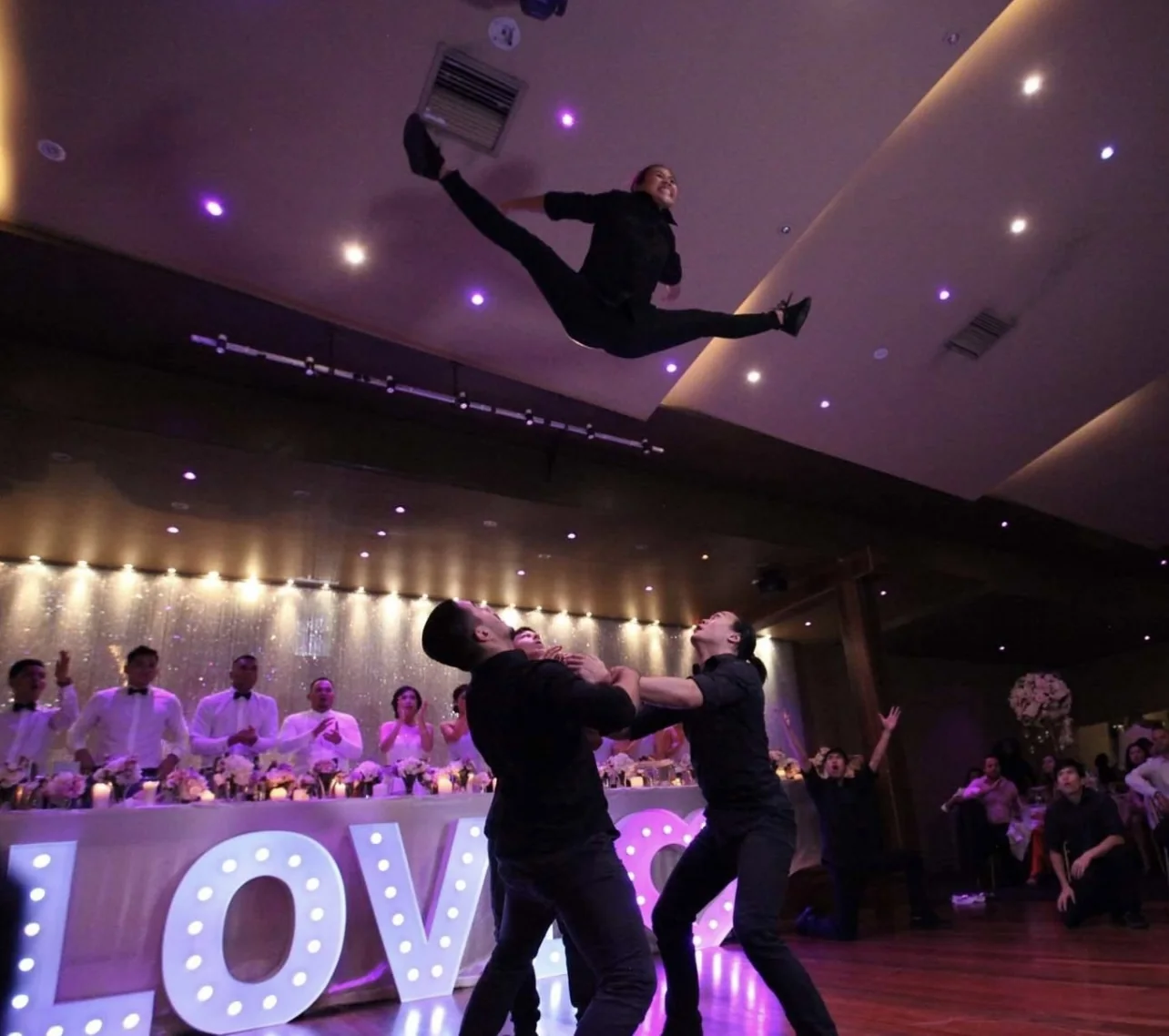 Surprise waiters performing at a corporate event
