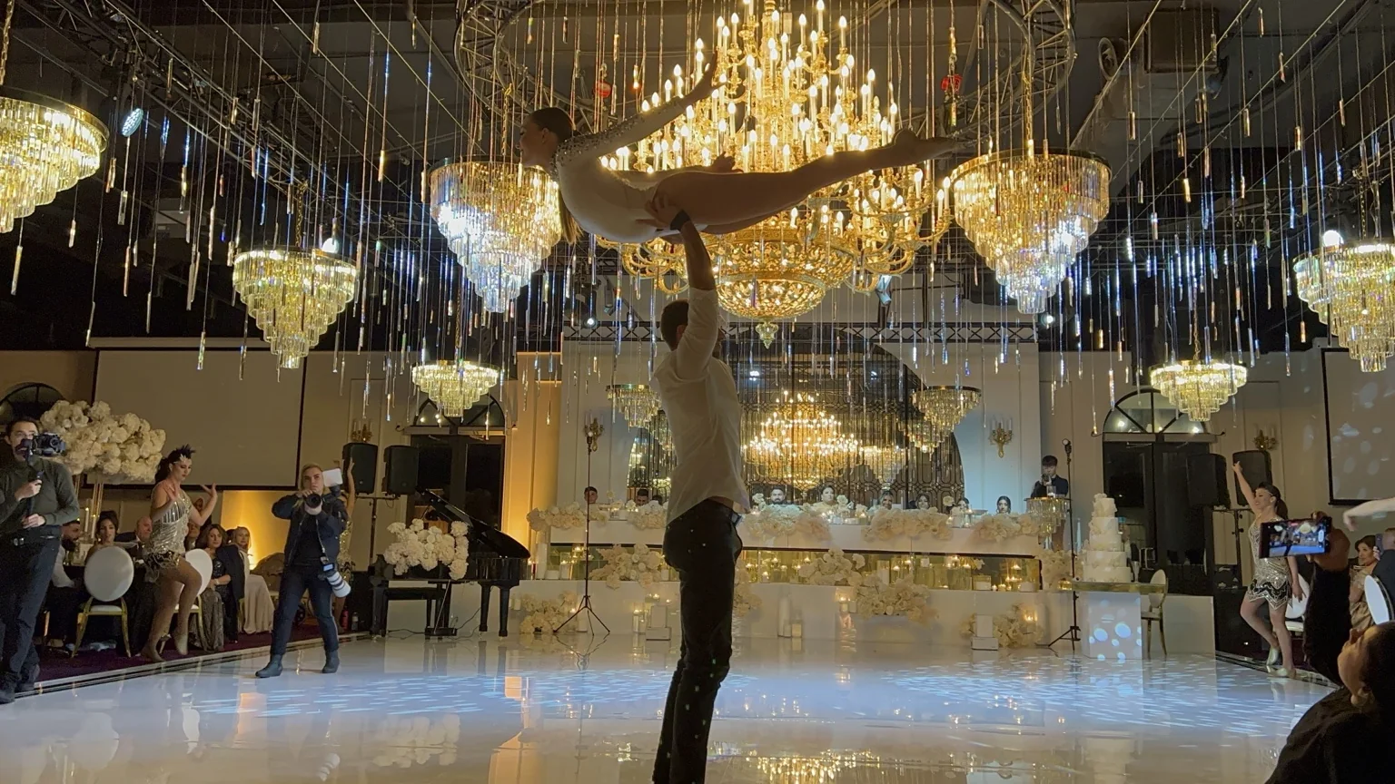 Professional Latin dancers performing a floor show at a wedding reception